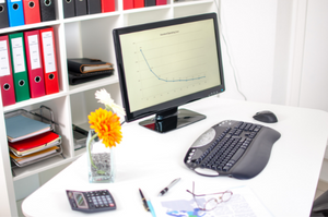 Neat work area with tidy desk and well organised storage space